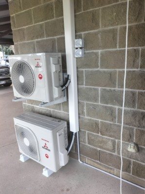 Close-up of the stacked units with the isolator switches beside them